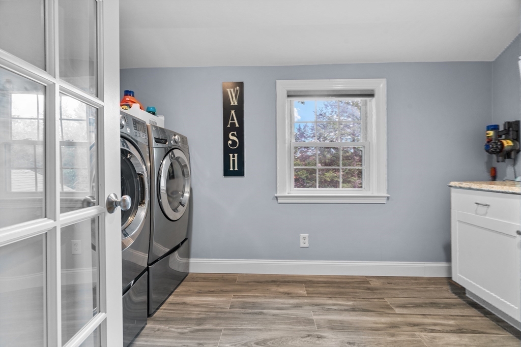 26 Cushing Road Westwood, MA 02090 - Photo 28 of 42 a view of a storage & utility room with a window