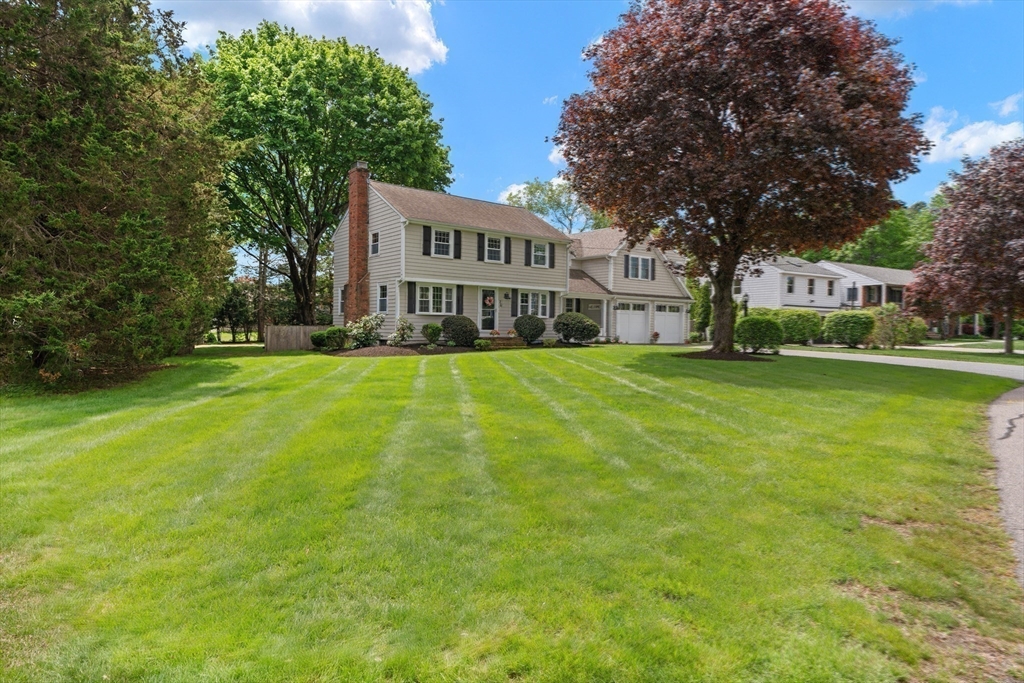 26 Cushing Road Westwood, MA 02090 - Photo 42 of 42 a view of a house with a big yard and large trees