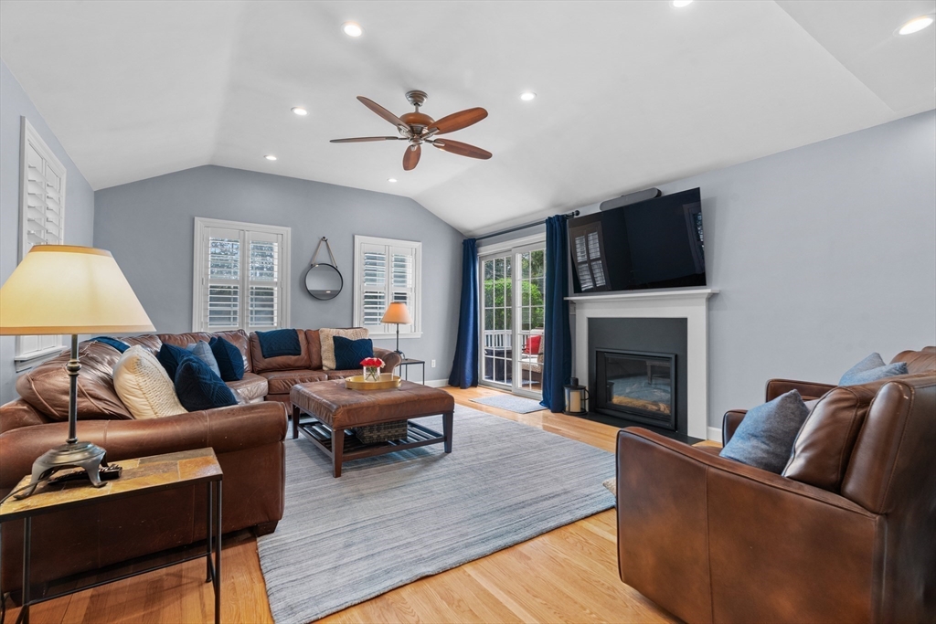 26 Cushing Road Westwood, MA 02090 - Photo 6 of 42 a living room with furniture fireplace and a flat screen tv