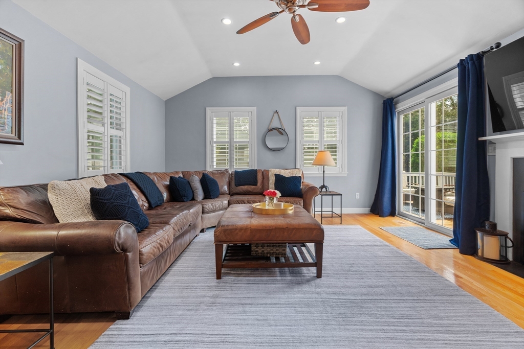 26 Cushing Road Westwood, MA 02090 - Photo 7 of 42 a living room with furniture and a flat screen tv
