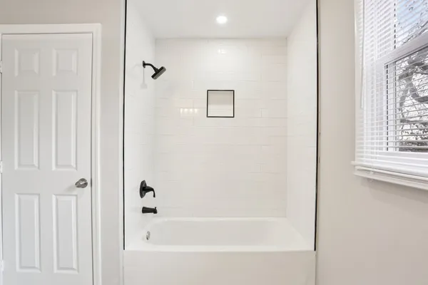 a bathroom with a bathtub