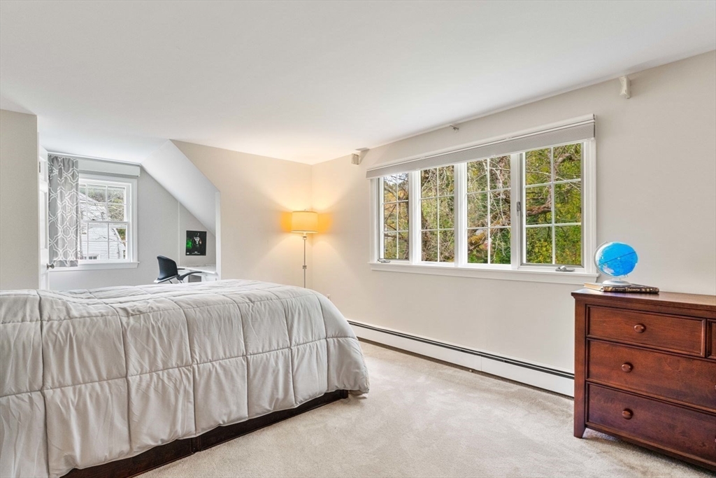 12 Winthrop Road Wayland, MA 01778 - Photo 17 of 22 a bedroom with a bed and a window
