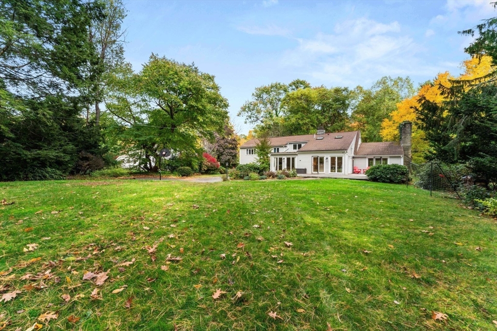 12 Winthrop Road Wayland, MA 01778 - Photo 22 of 22 a house view with a garden space