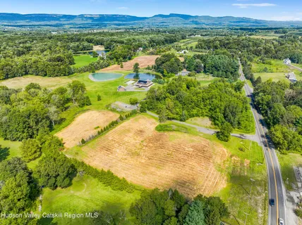 a view of a lake with mountains in the background