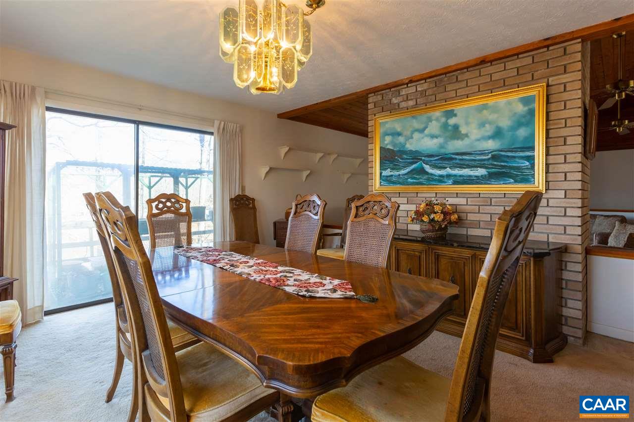 15 Condor Road Palmyra, VA 22963 - Photo 18 of 39 a view of a dining room with furniture window and outside view