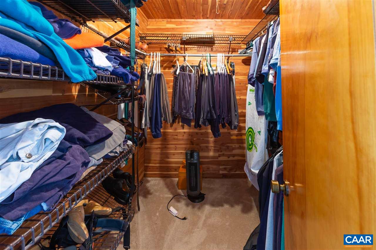 15 Condor Road Palmyra, VA 22963 - Photo 22 of 39 a view of walk in closet with clothes and shoes