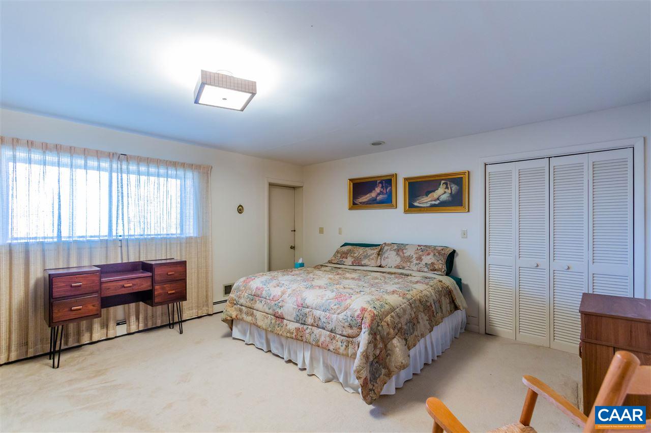 15 Condor Road Palmyra, VA 22963 - Photo 28 of 39 a bedroom with a bed and a window