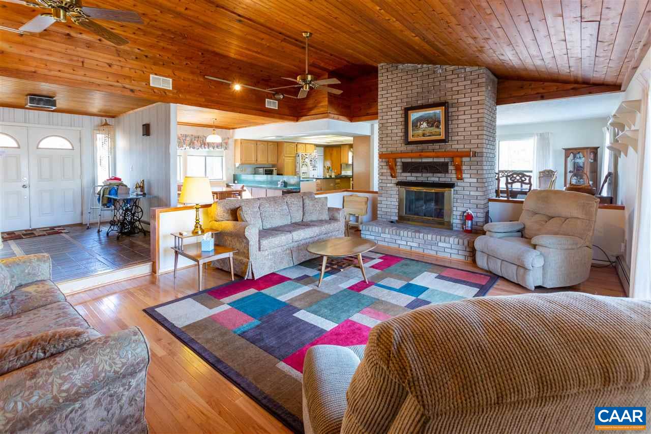 15 Condor Road Palmyra, VA 22963 - Photo 10 of 39 a living room with furniture a fireplace and pool table