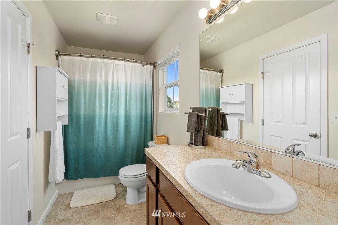 3032 183rd Place Southeast Bothell, WA 98012 - Photo 16 of 21 a bathroom with a sink toilet and shower