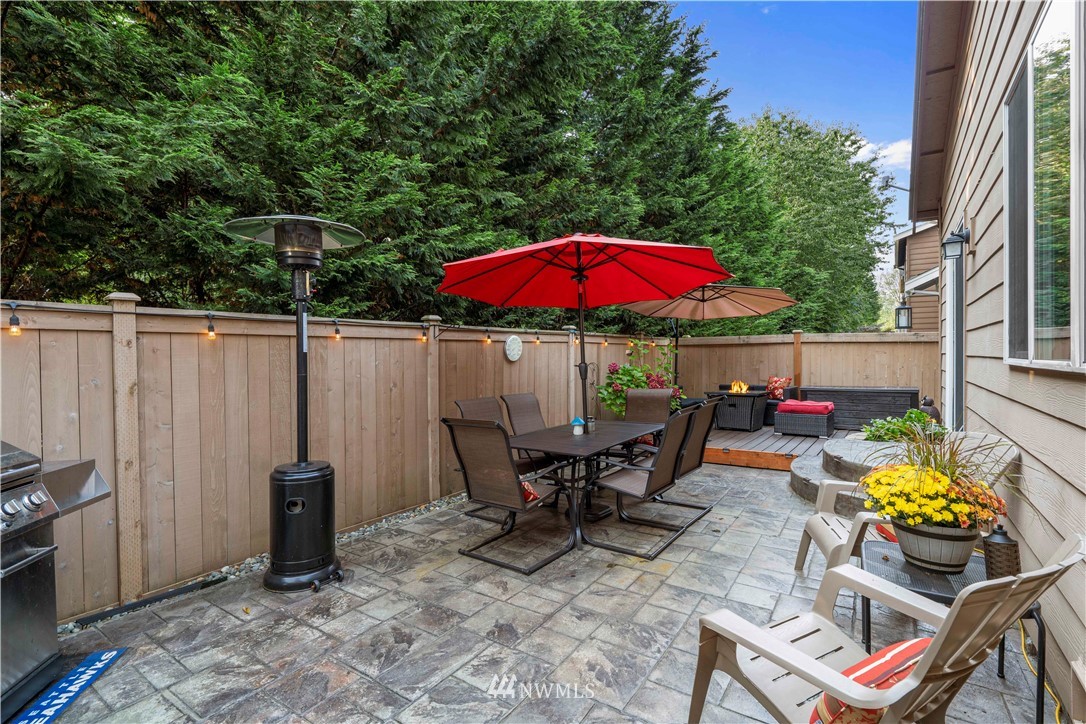 3032 183rd Place Southeast Bothell, WA 98012 - Photo 20 of 21 a view of a dinning table and chairs in the patio