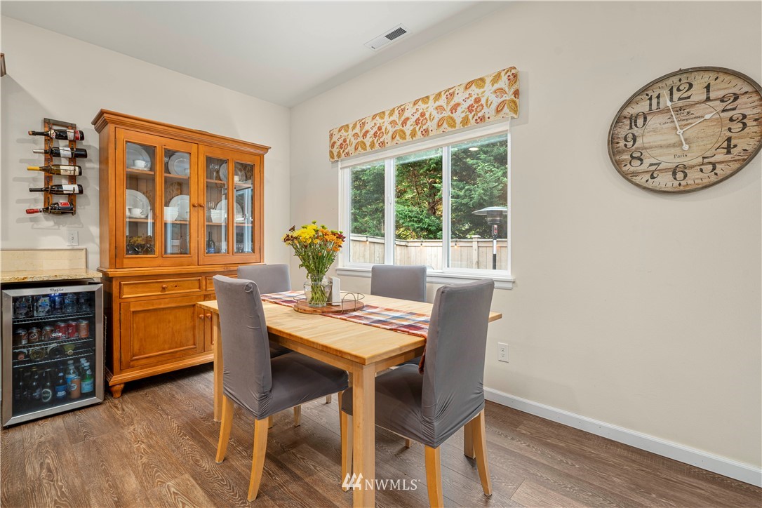3032 183rd Place Southeast Bothell, WA 98012 - Photo 7 of 21 a dining room with furniture and window