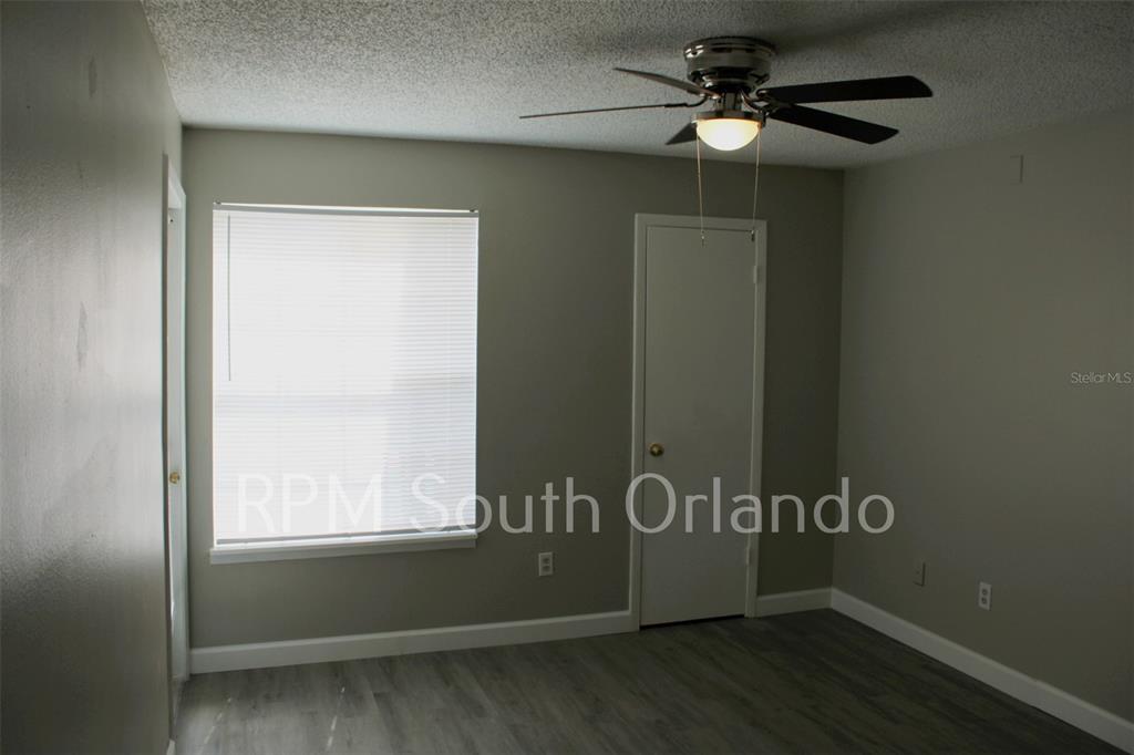 1908 Lake Atriums Circle, Unit 6 Orlando, FL 32839 - Photo 4 of 10 a view of an entryway with a window