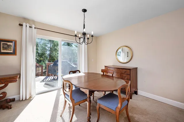 a kitchen with a stove a sink and a microwave