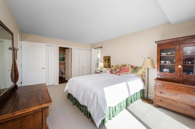 a view of living room with furniture and a window