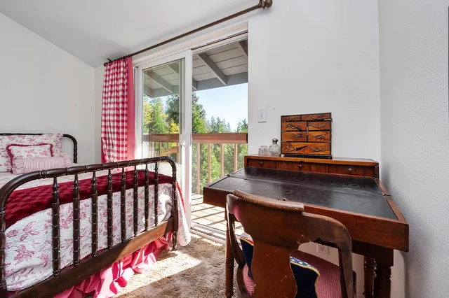 a view of balcony with furniture