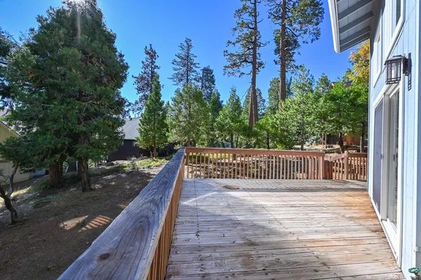 a view of deck and trees