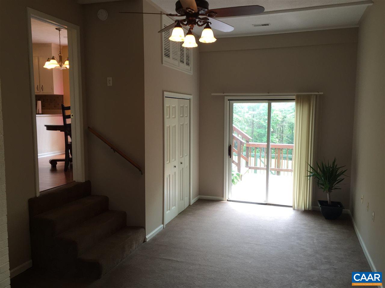 340 Gold Mine Road Palmyra, VA 22963 - Photo 29 of 38 a view of a livingroom with a ceiling fan and window