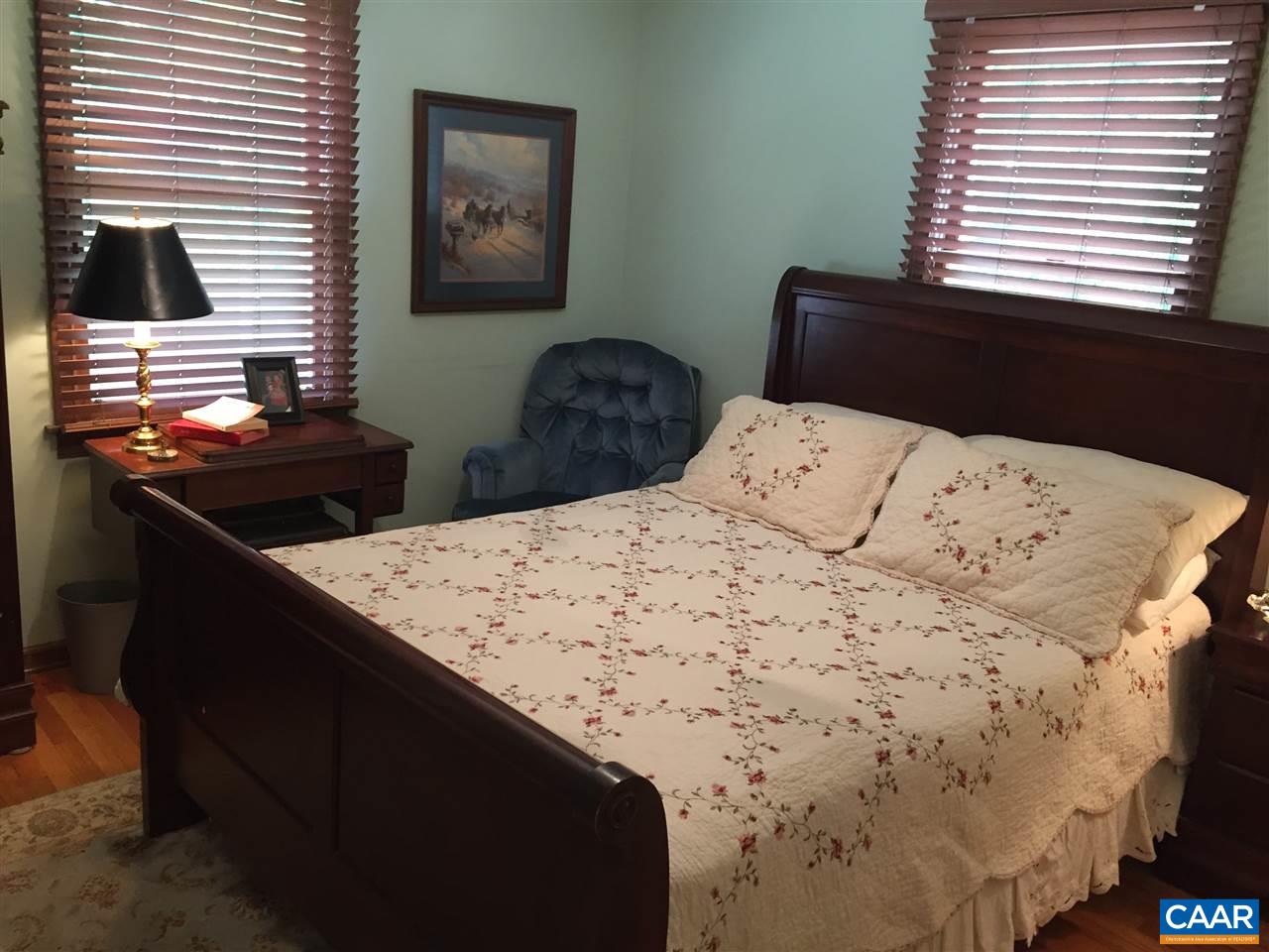 340 Gold Mine Road Palmyra, VA 22963 - Photo 30 of 38 a bedroom with a bed and a window