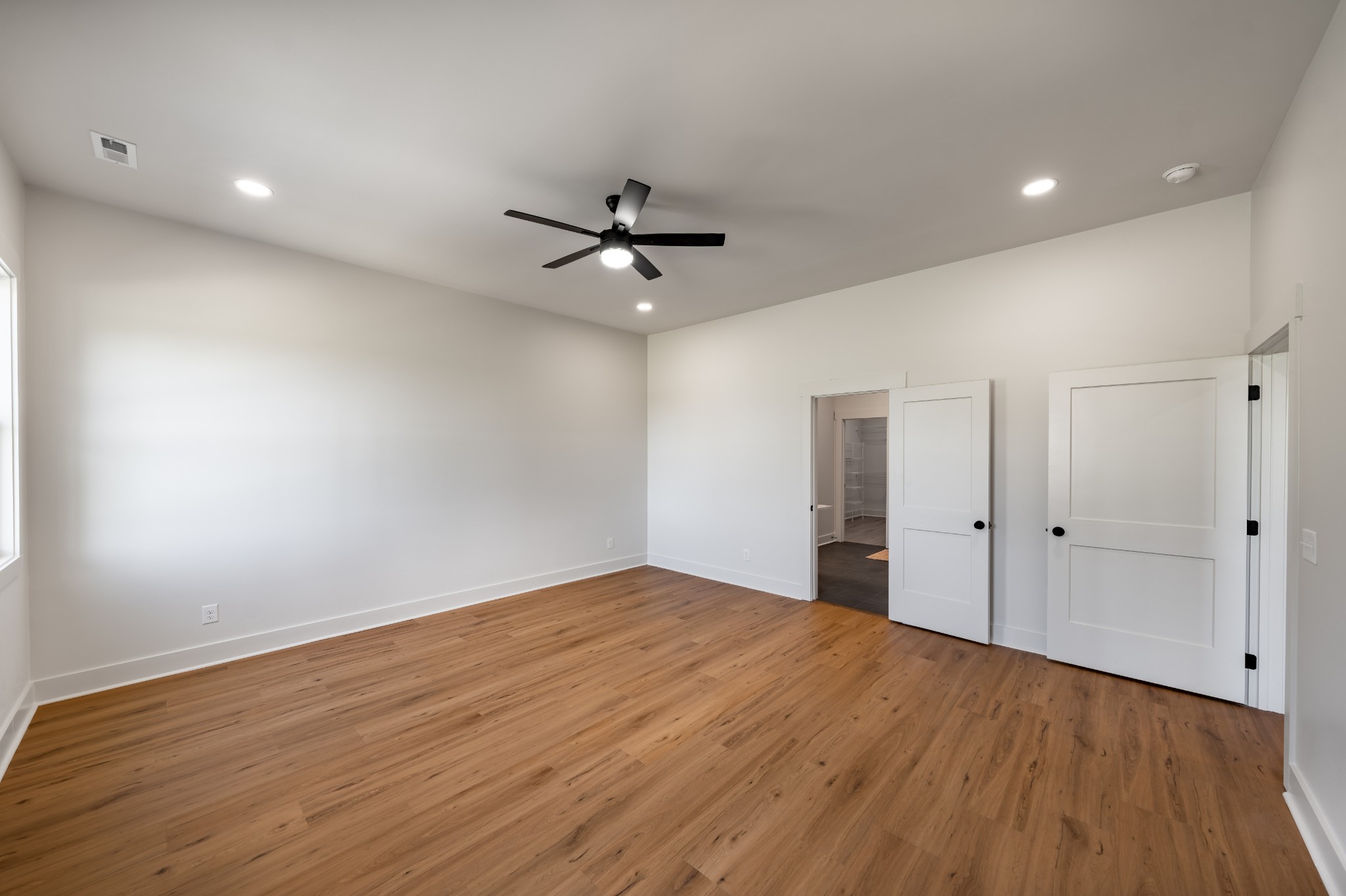 4031 Wells Road Springfield, TN 37172 - Photo 26 of 39 wooden floor in an empty room with a window