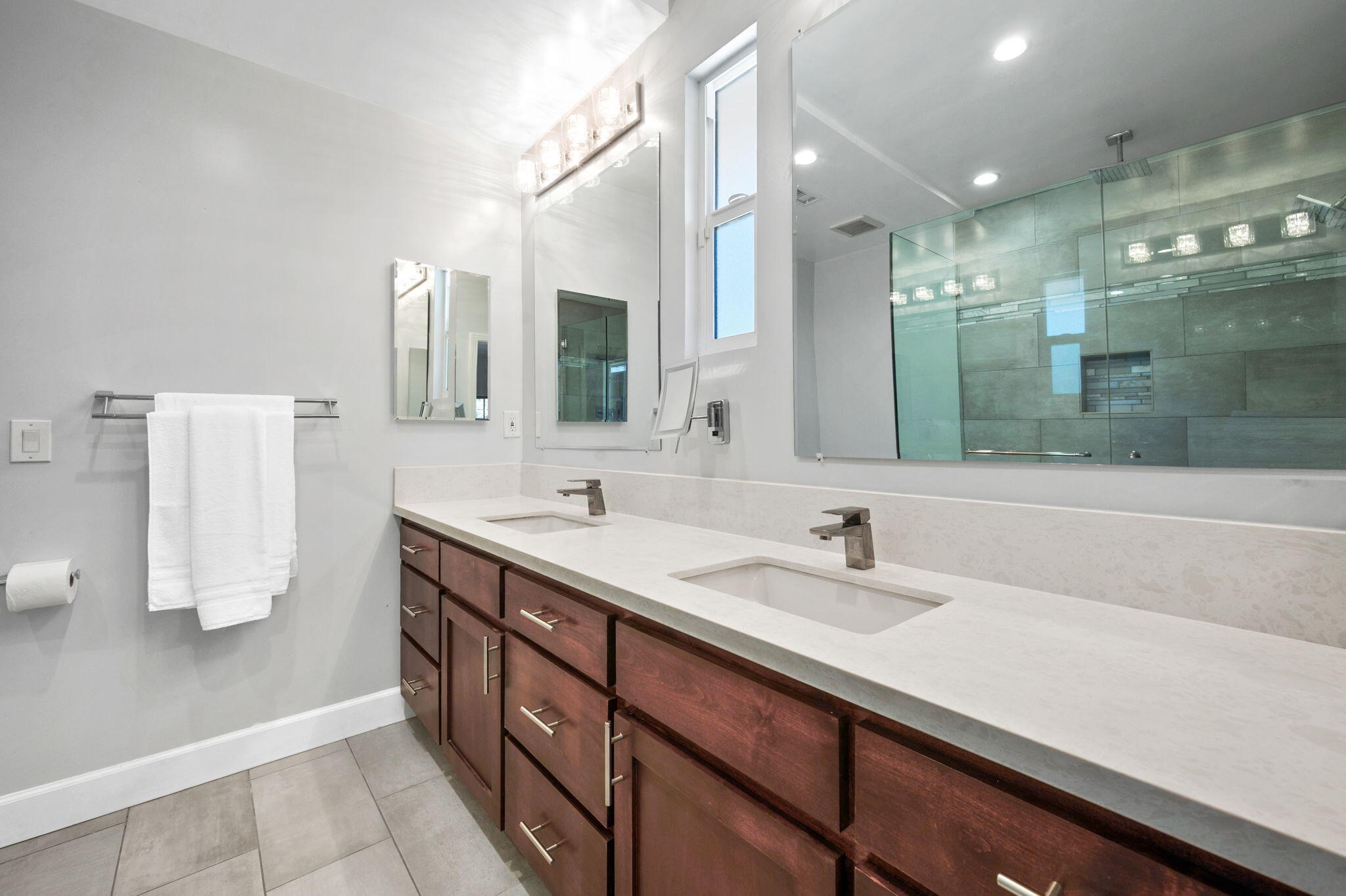 5905 Old Wheeler Road La Verne, CA 91750 - Photo 42 of 81 a bathroom with a sink and a mirror