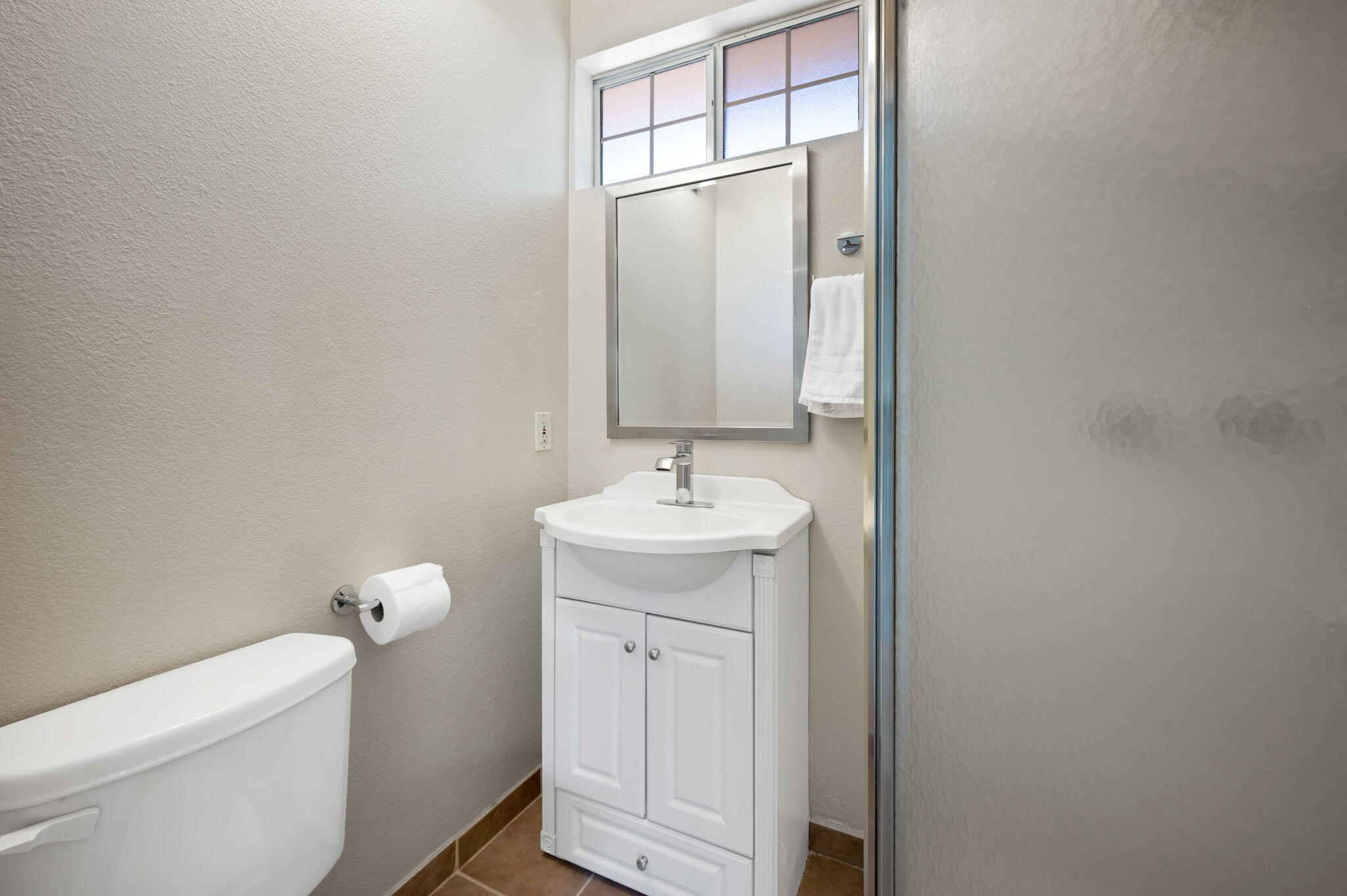 5905 Old Wheeler Road La Verne, CA 91750 - Photo 49 of 81 a bathroom with a toilet a sink a mirror and vanity