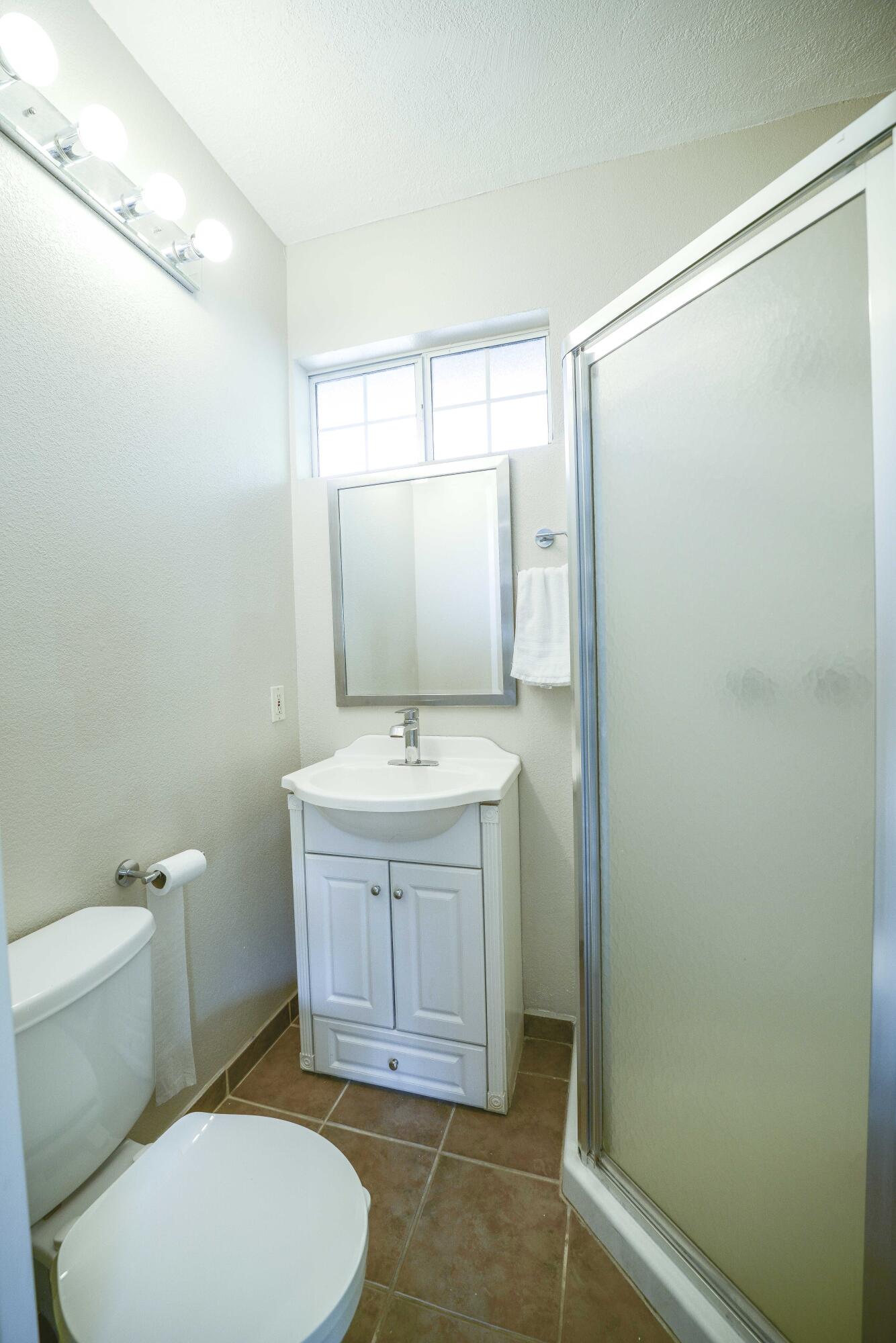 5905 Old Wheeler Road La Verne, CA 91750 - Photo 50 of 81 a bathroom with a sink a toilet and shower