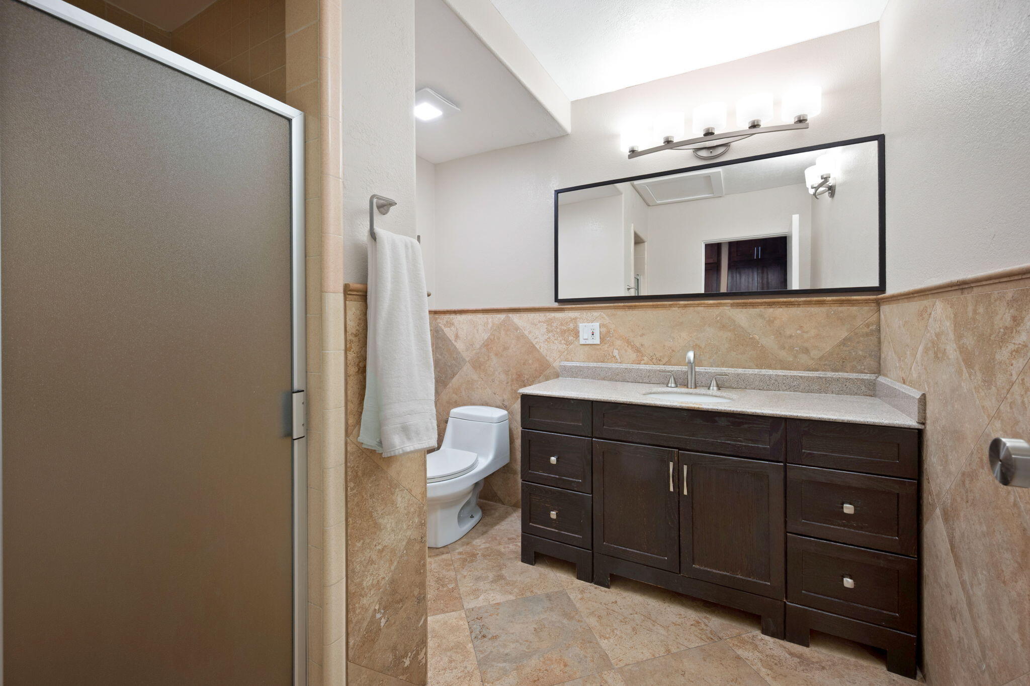 5905 Old Wheeler Road La Verne, CA 91750 - Photo 53 of 81 a bathroom with a sink a toilet and mirror