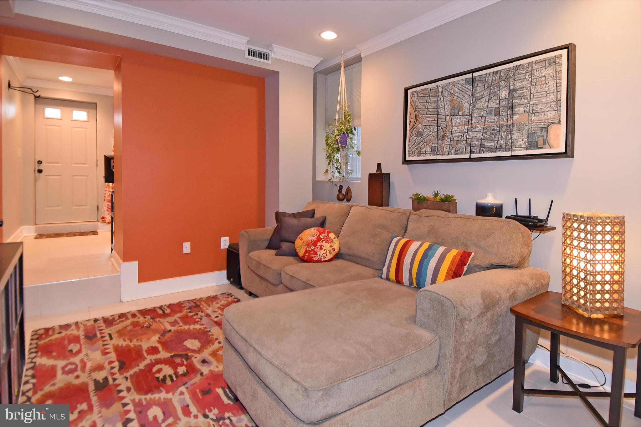 1126 Columbia Road Northwest, Unit 1 Washington, DC 20009 - Photo 22 of 30 a bedroom with furniture and a rug