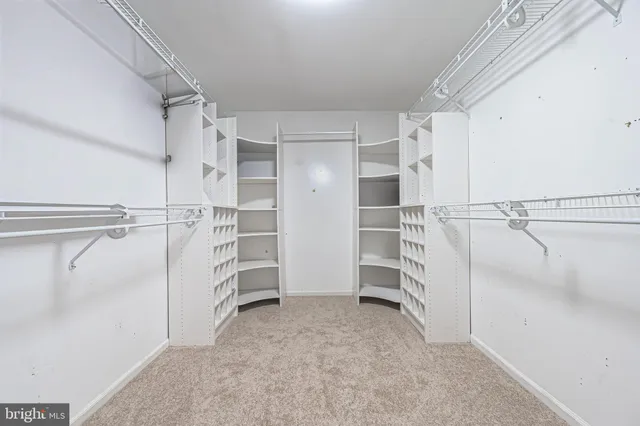 wooden floor with white walls