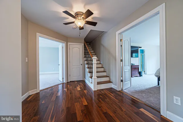 a view of entryway with wooden floor
