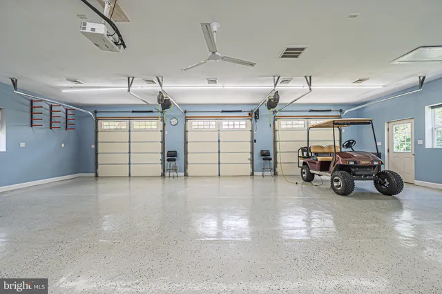a view of a livingroom with furniture and a window