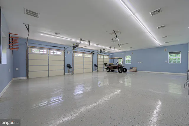 a view of a chairs and table in a room