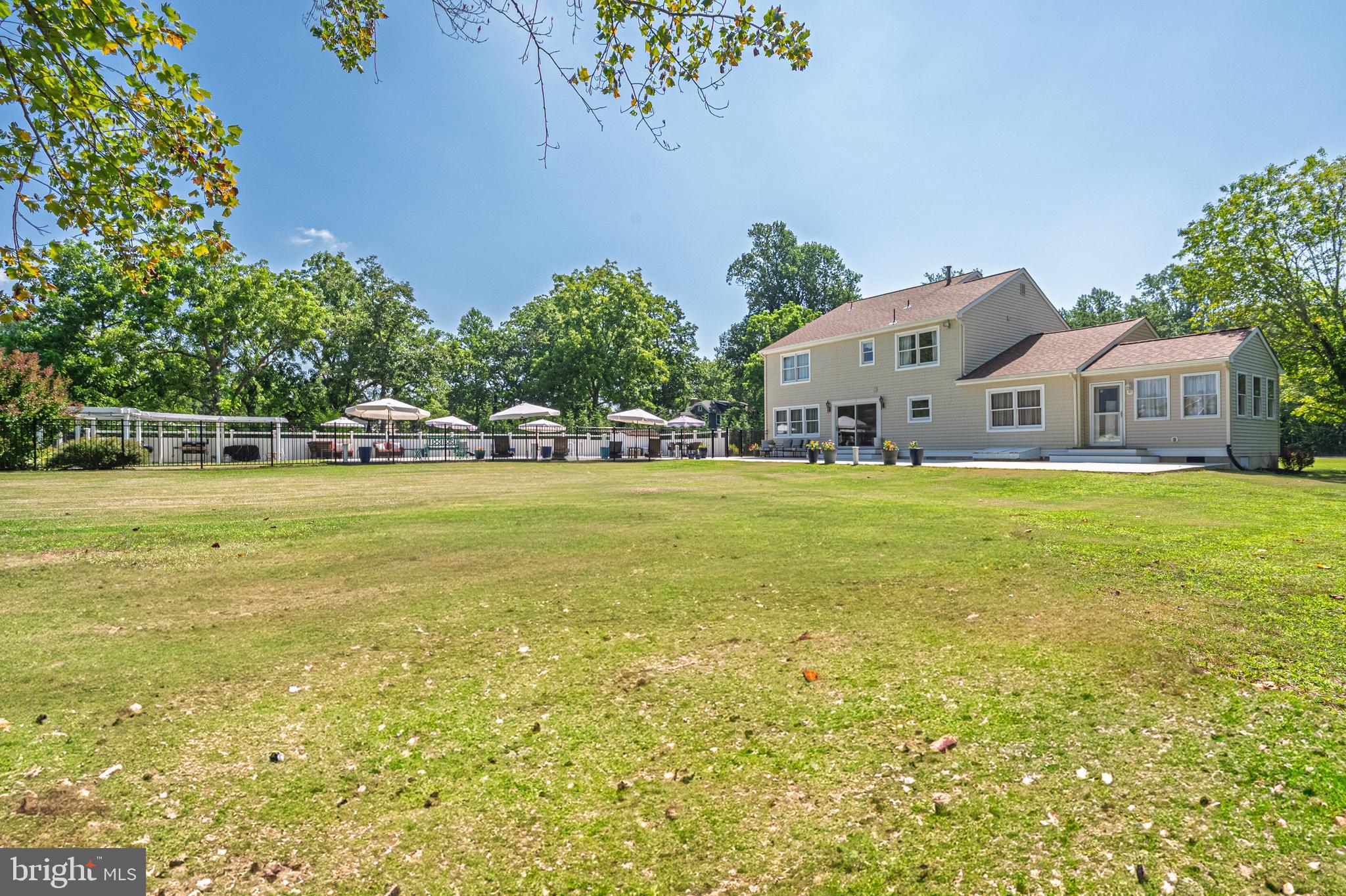 900 Elwood Road, Unit MULLICA Hammonton, NJ 08037 - Photo 53 of 56 a view of a house with a big yard and potted plants in front of the house