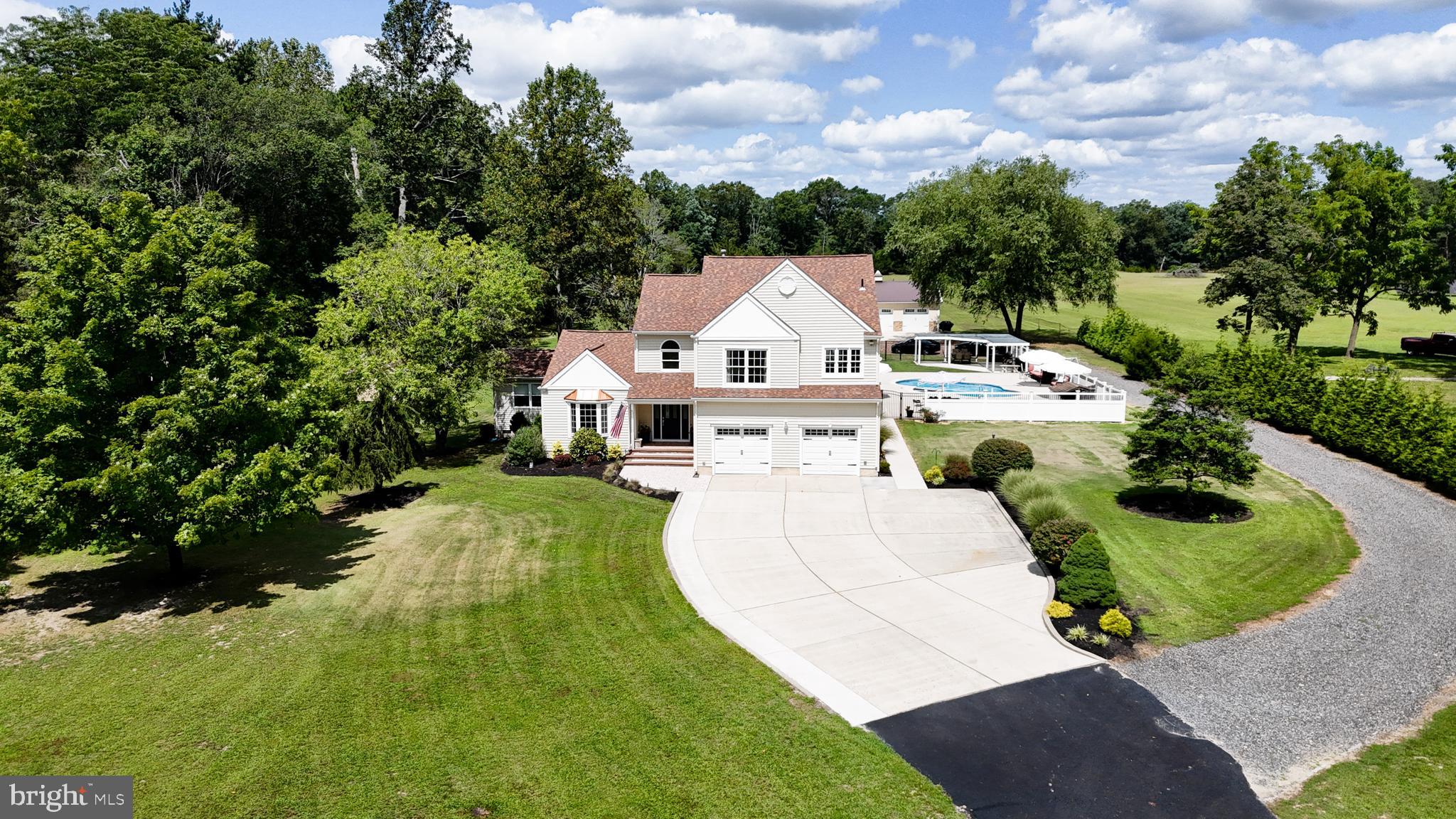 900 Elwood Road, Unit MULLICA Hammonton, NJ 08037 - Photo 56 of 56 a view of a white house with a big yard plants and large trees