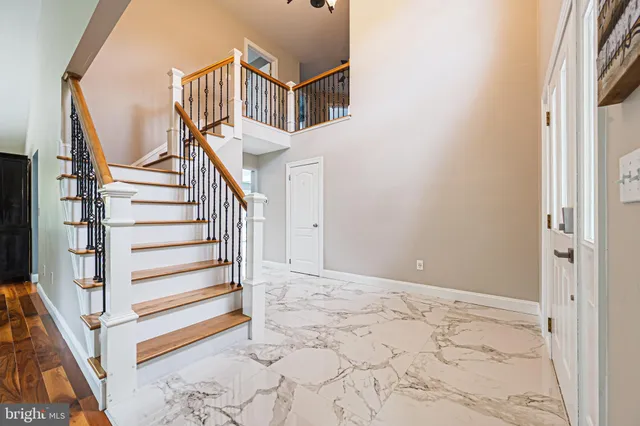 a view of entryway with a front door