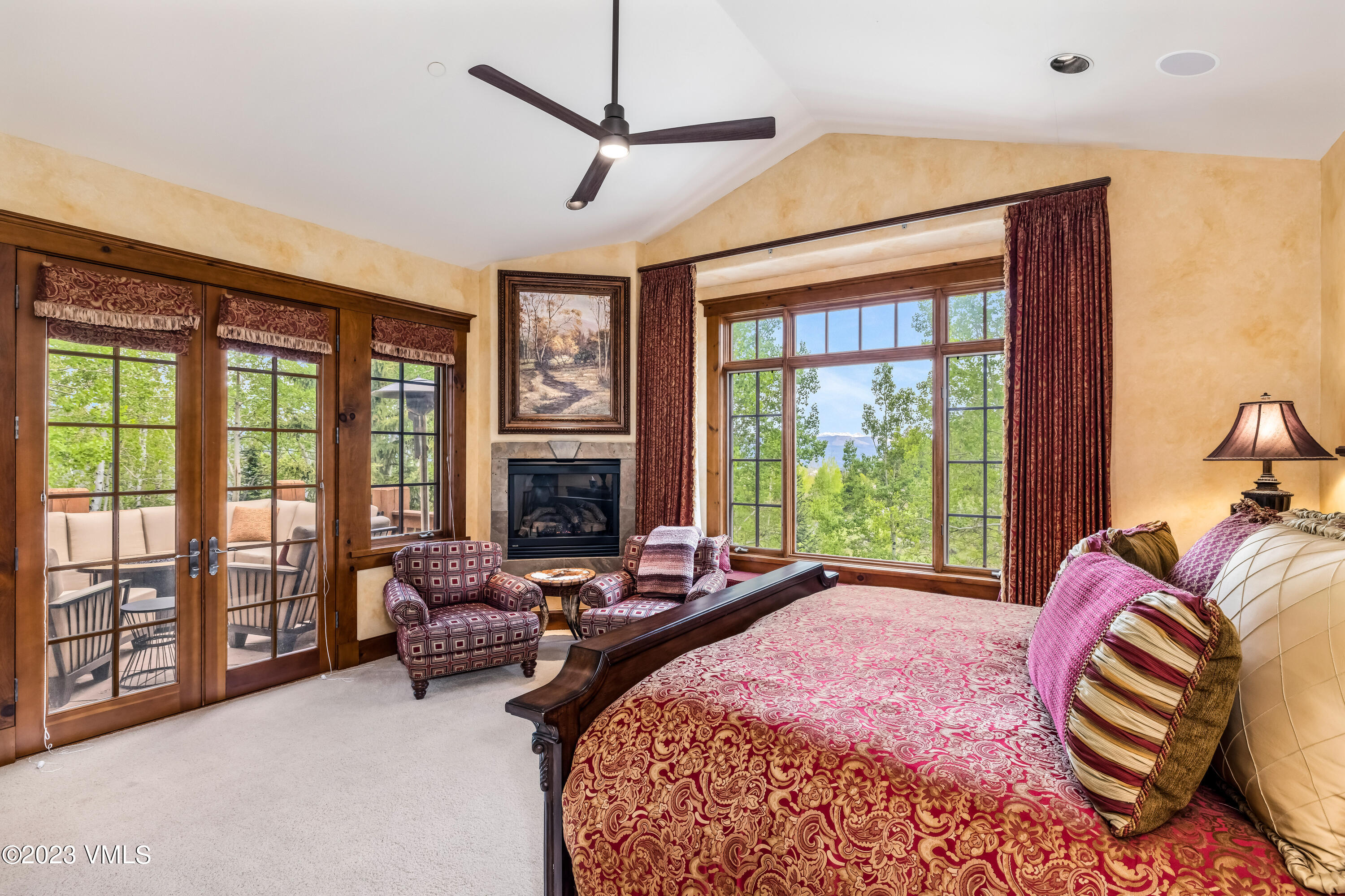 181 Summit Trail Edwards, CO 81632 - Photo 19 of 40 a spacious bedroom with a bed and a large window