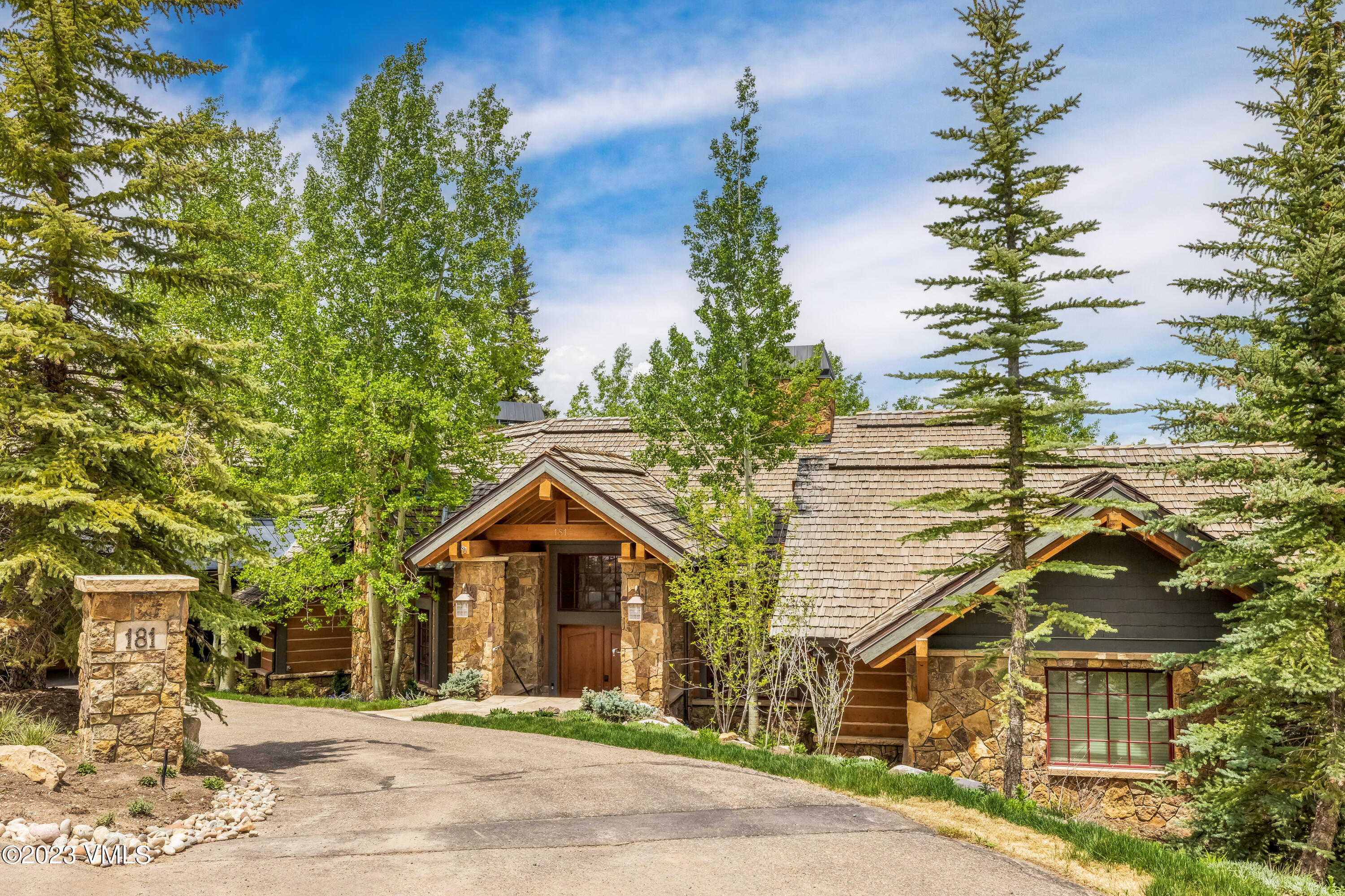 181 Summit Trail Edwards, CO 81632 - Photo 2 of 40 a front view of a house with a yard