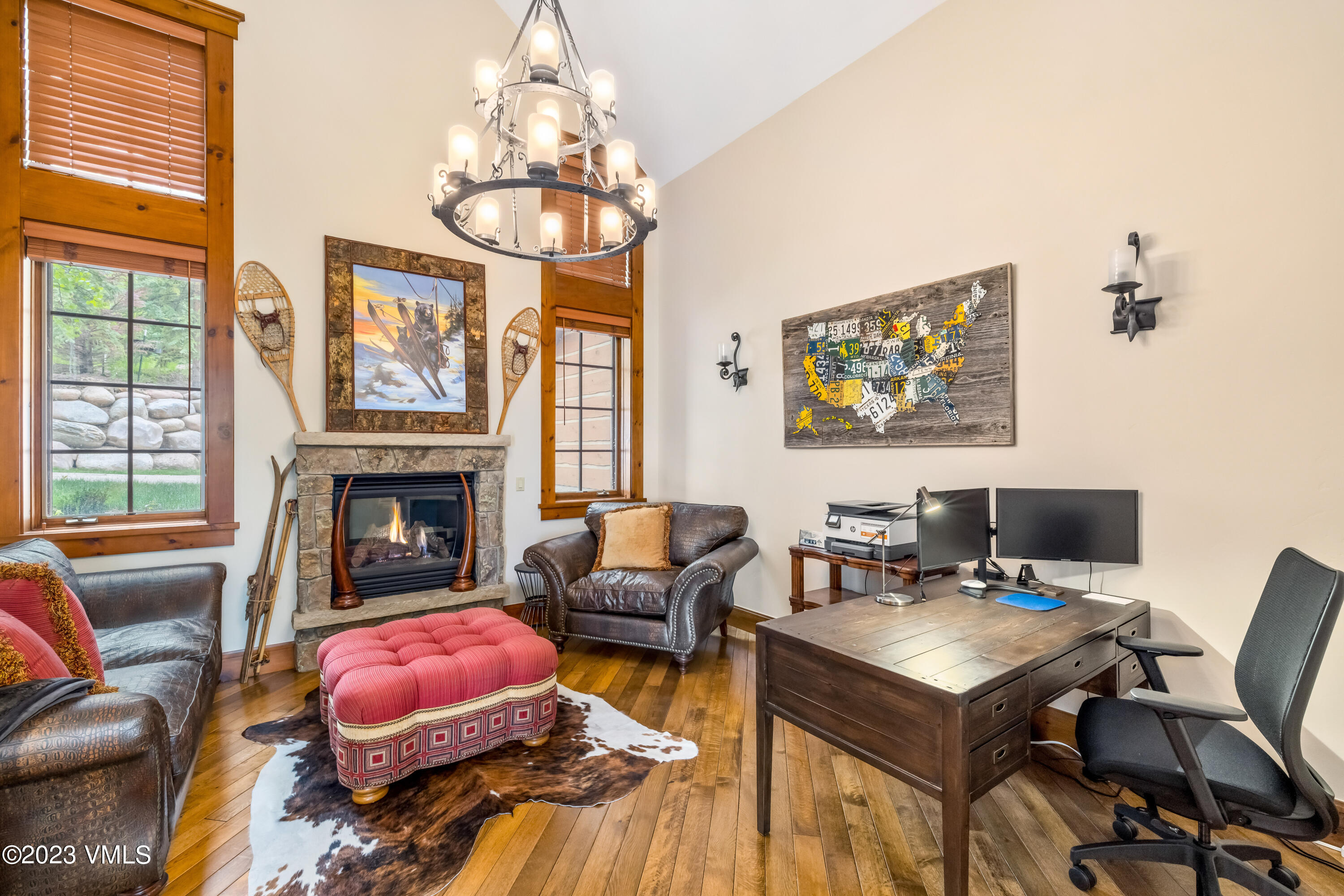 181 Summit Trail Edwards, CO 81632 - Photo 21 of 40 a living room with furniture a fireplace and a flat screen tv
