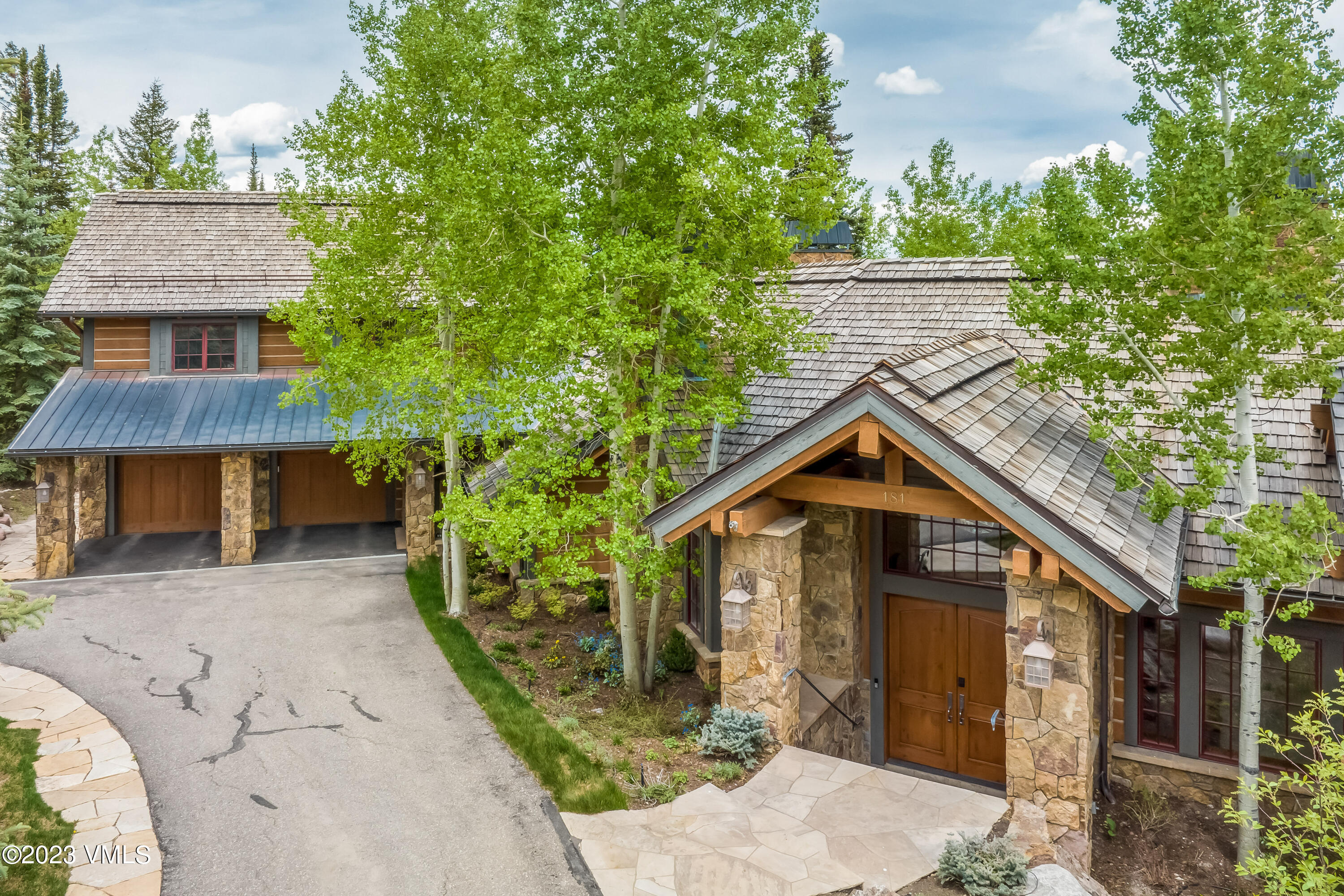 181 Summit Trail Edwards, CO 81632 - Photo 3 of 40 an front view of a house with a yard