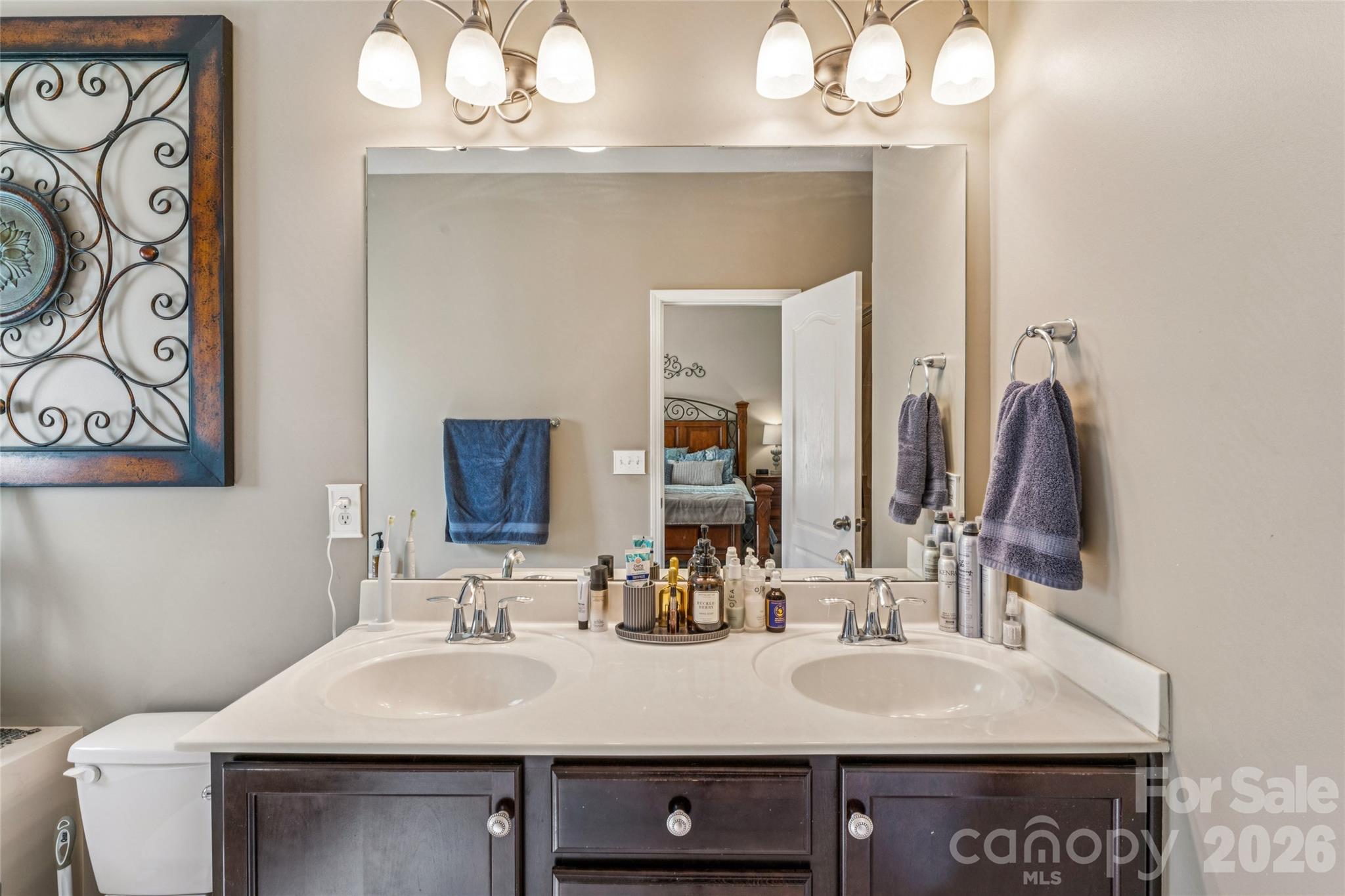 8211 Viewpoint Lane Cornelius, NC 28031 - Photo 15 of 28 a bathroom with a sink and a mirror