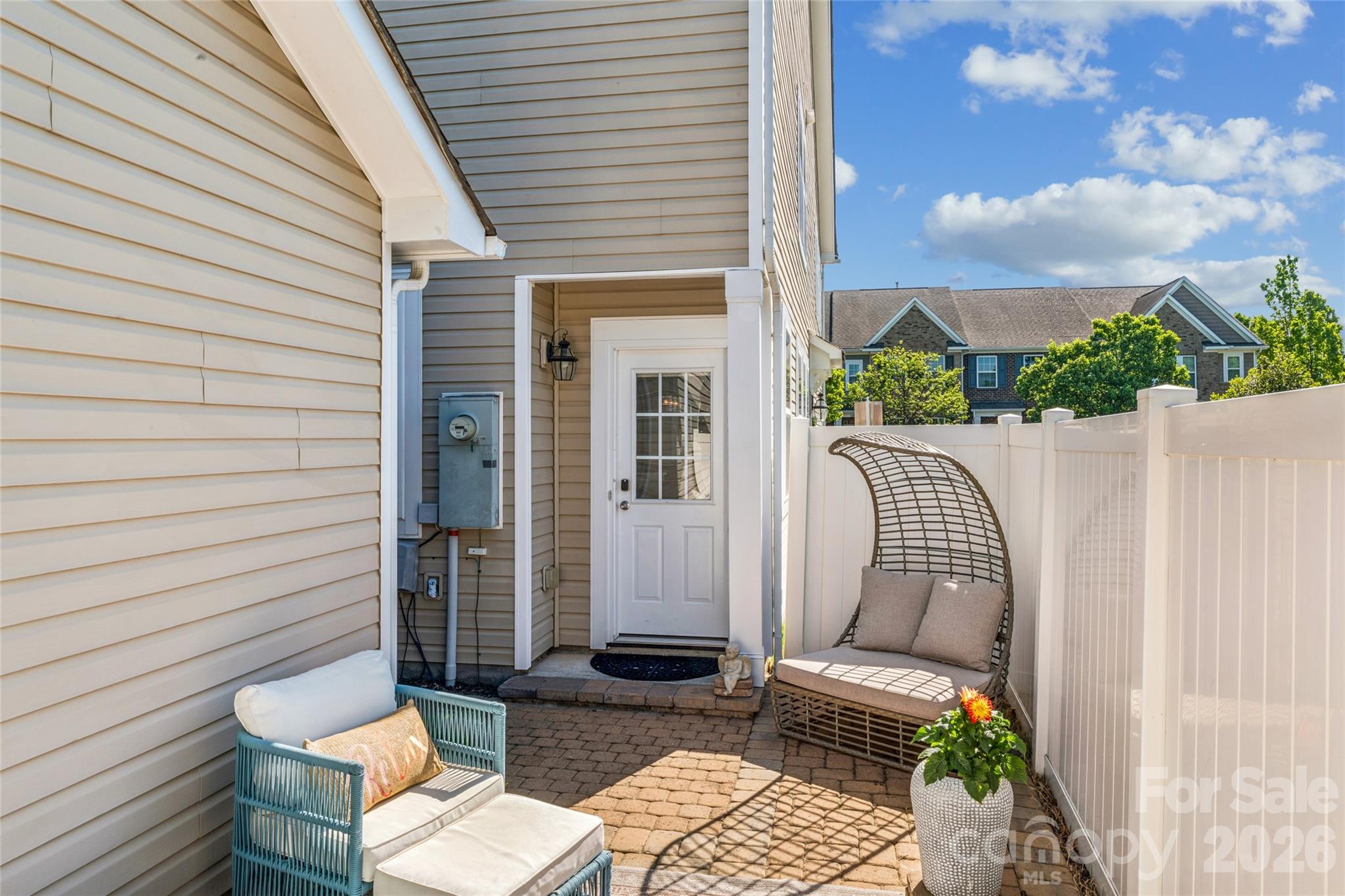 8211 Viewpoint Lane Cornelius, NC 28031 - Photo 21 of 28 a view of a patio with couple of chairs and a couch