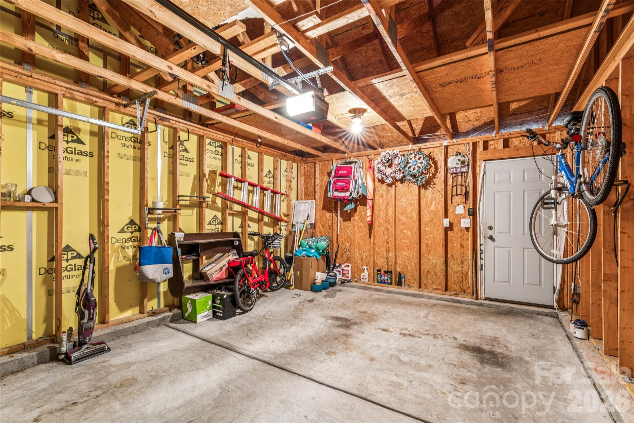 8211 Viewpoint Lane Cornelius, NC 28031 - Photo 24 of 28 a view of a room with gym equipment