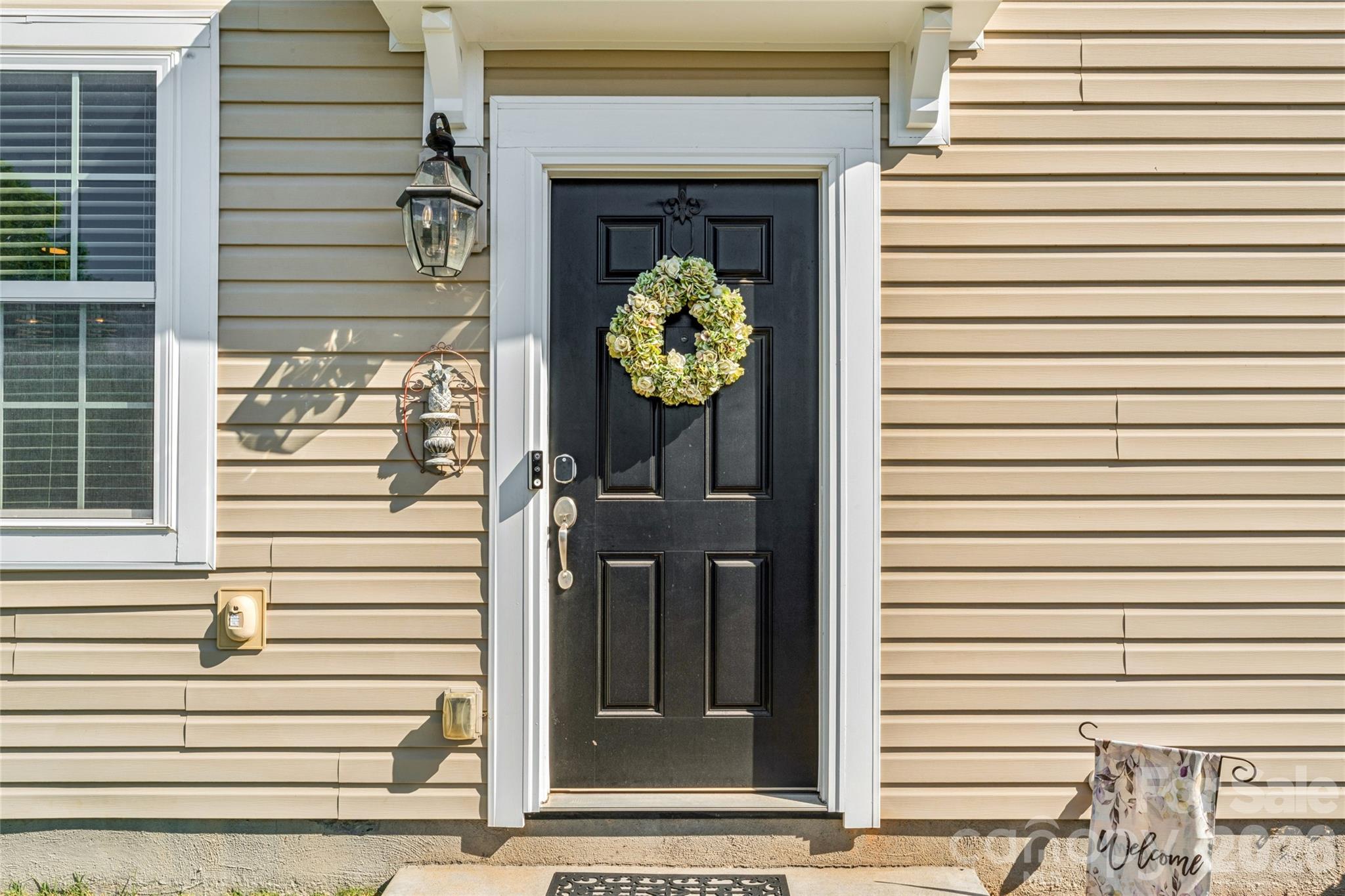 8211 Viewpoint Lane Cornelius, NC 28031 - Photo 25 of 28 a view of a entryway of the house