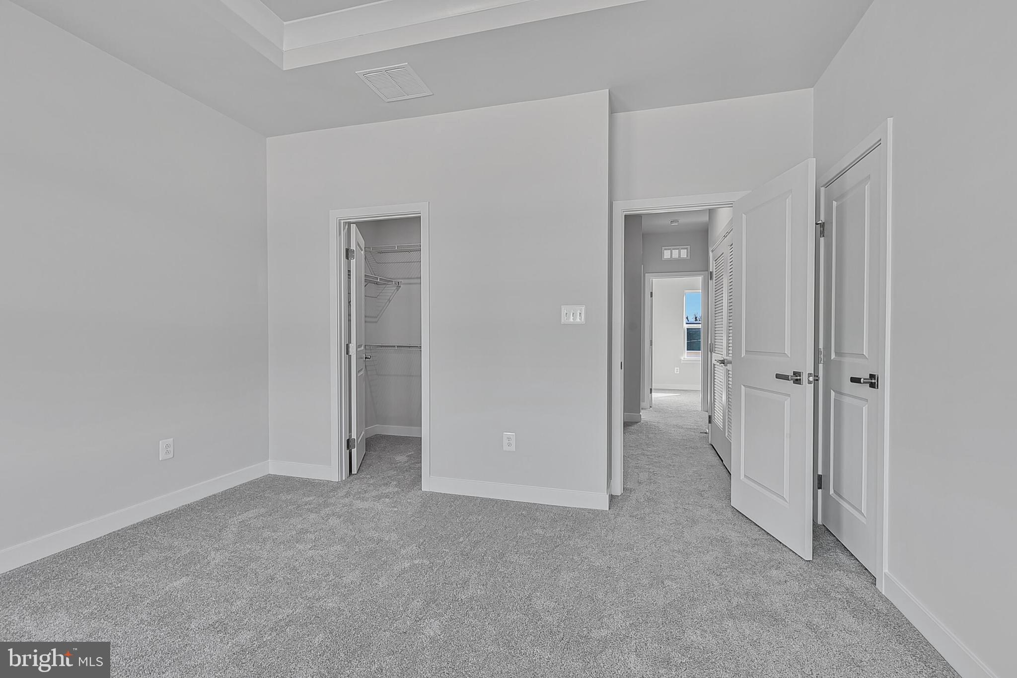 60 C Oasis Avenue Ranson, WV 25438 - Photo 33 of 38 a view of an empty room and closet area