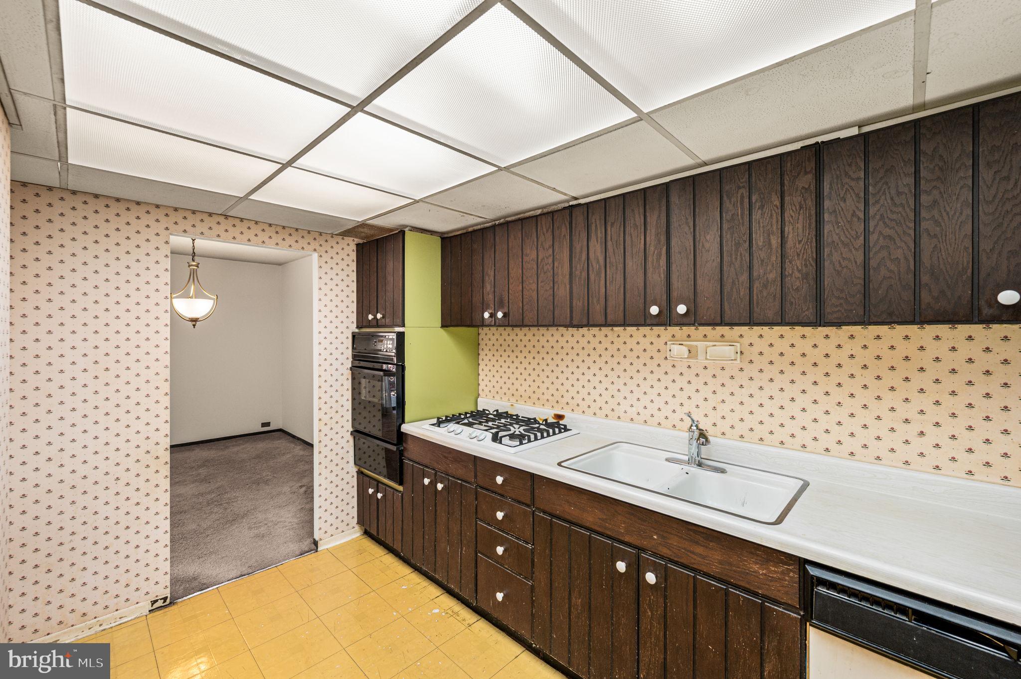 801 Yale Avenue, Unit 511 Swarthmore, PA 19081 - Photo 10 of 28 a kitchen with a sink and cabinets