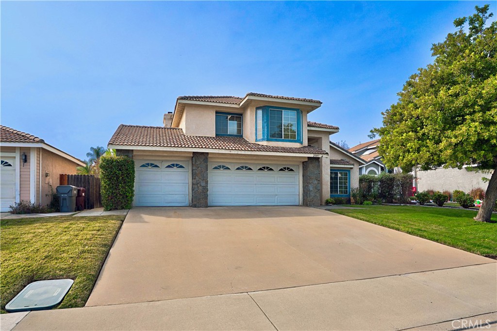 25497 Blackwood Road Murrieta, CA 92563 - Photo 1 of 44 a front view of a house with a yard and garage