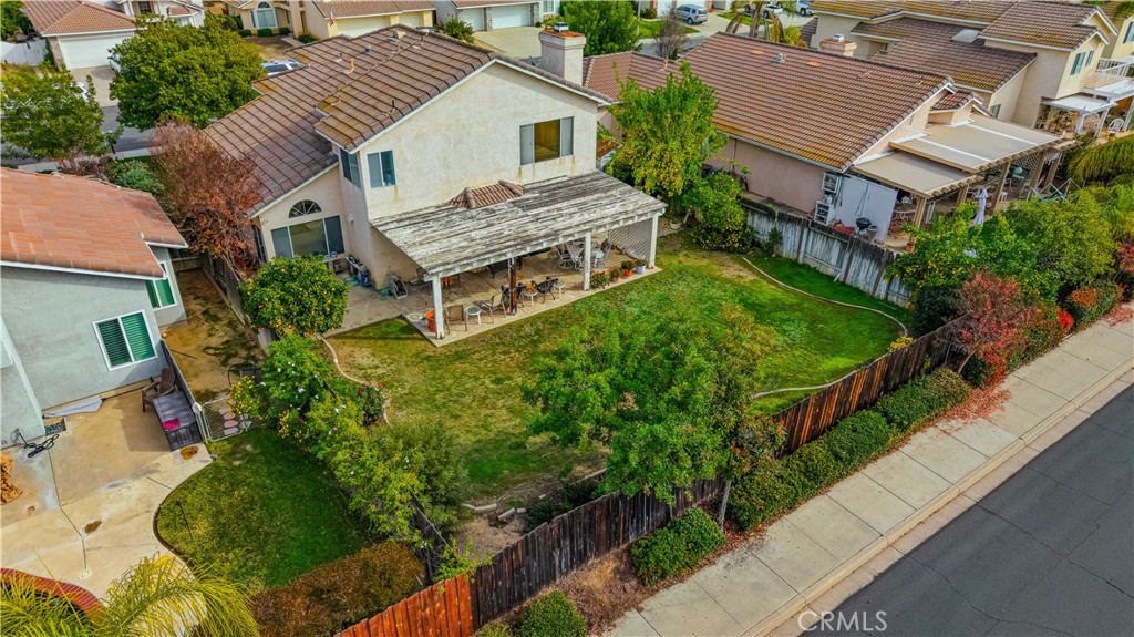 25497 Blackwood Road Murrieta, CA 92563 - Photo 30 of 44 an aerial view of a house with a yard and potted plants