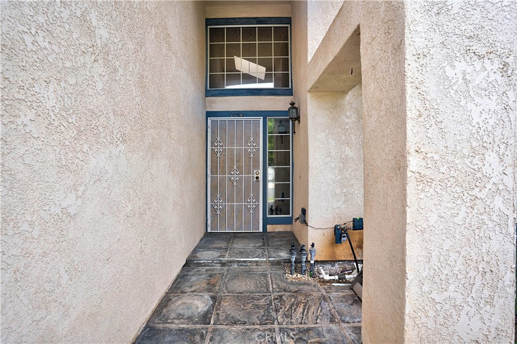 25497 Blackwood Road Murrieta, CA 92563 - Photo 5 of 44 a view of a house with a outdoor space