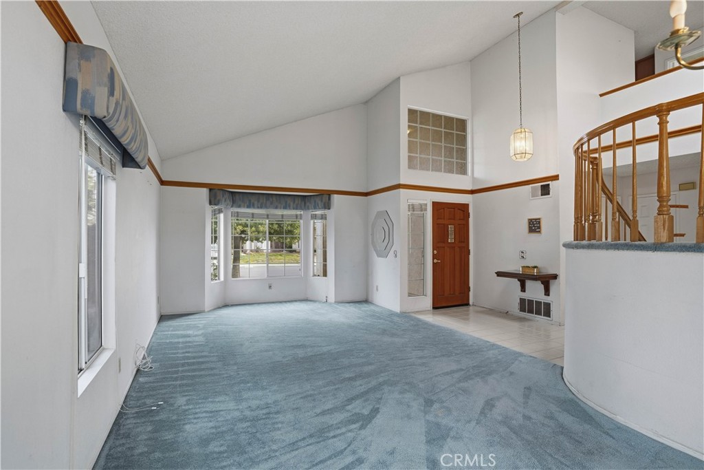 25497 Blackwood Road Murrieta, CA 92563 - Photo 9 of 44 a view of an empty room with a window