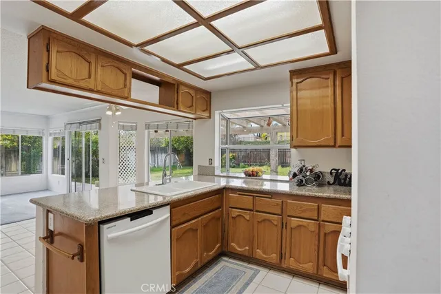 a view of a chairs and table in the patio